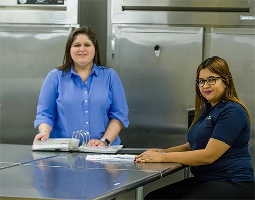 Diversity and inclusion at Pace. We are people first. Two scientists working in laboratory.