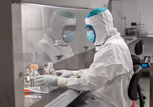 Pace Scientist in Full PPE working in laboratory. Pace Test Method for Anthrax Investigations.